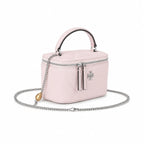 Tory Burch Kira soft pink lambskin bag with detachable chain shoulder strap A small and elegant cosmetic bag that can also be worn crossbody suitable for women