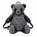 Tory Burch T-strap canvas and black faux leather teddy bear backpack  playful yet stylish  Suitable for women and teenagers