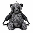 Tory Burch T-strap canvas and black faux leather teddy bear backpack  playful yet stylish  Suitable for women and teenagers