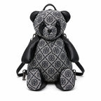 Tory Burch T-strap canvas and black faux leather teddy bear backpack  playful yet stylish  Suitable for women and teenagers
