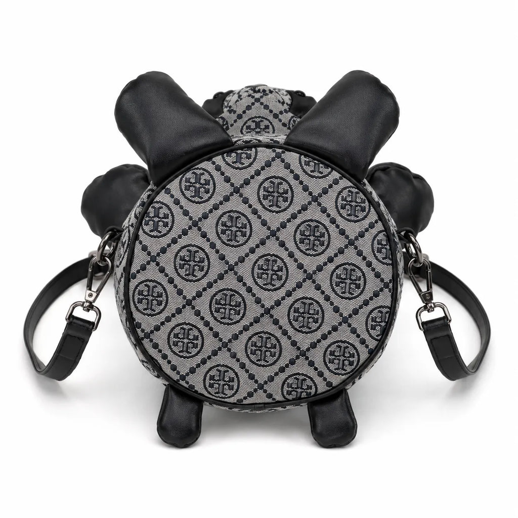 Tory Burch T-strap canvas and black faux leather teddy bear backpack  playful yet stylish  Suitable for women and teenagers