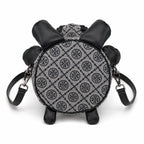 Tory Burch T-strap canvas and black faux leather teddy bear backpack  playful yet stylish  Suitable for women and teenagers