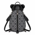 Tory Burch T-strap canvas and black faux leather teddy bear backpack  playful yet stylish  Suitable for women and teenagers