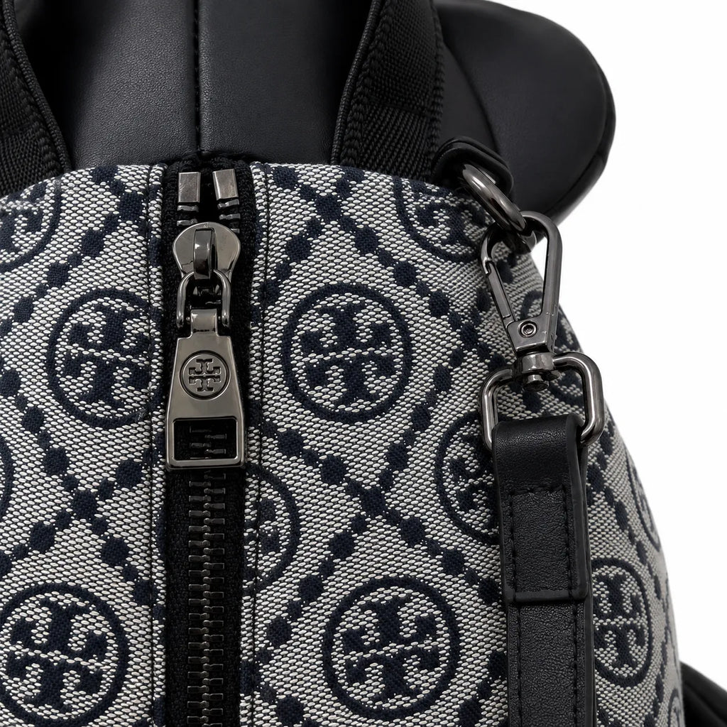 Tory Burch T-strap canvas and black faux leather teddy bear backpack  playful yet stylish  Suitable for women and teenagers