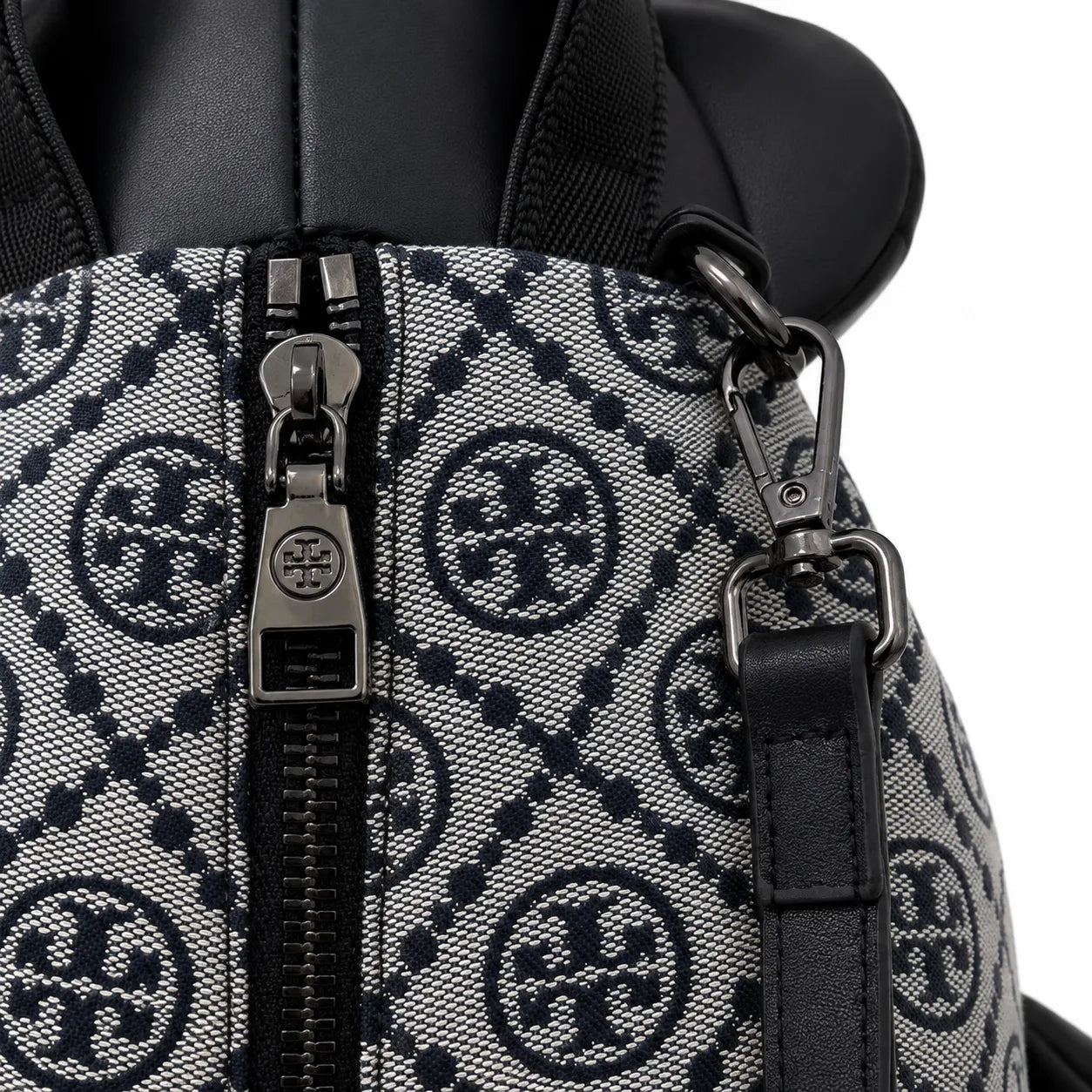 Tory Burch T-strap canvas and black faux leather teddy bear backpack  playful yet stylish  Suitable for women and teenagers