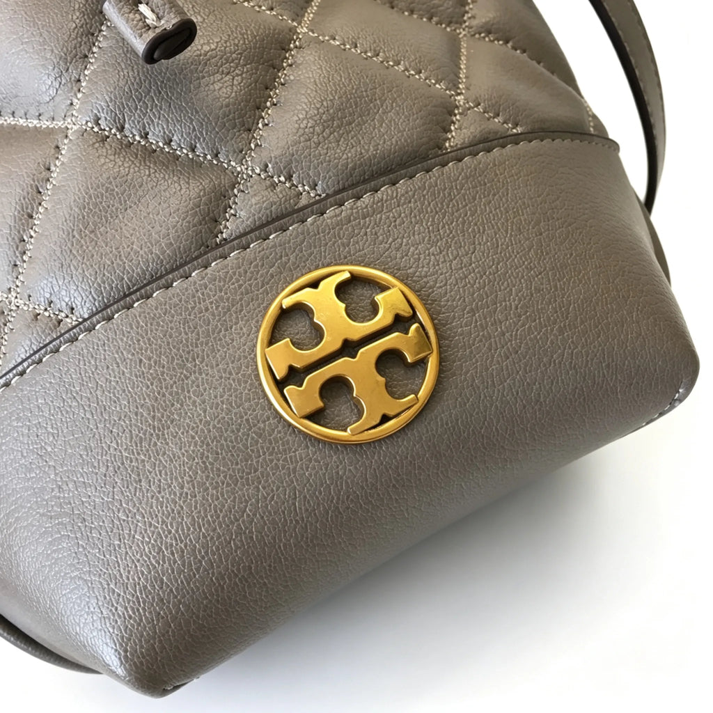 Tory Burch Willa | Grey-brown lambskin leatheradorned with a gold double-T logo detachable chain shoulder strap  drawstring closure  women's designer handbag