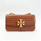 Tory Burch Eleanor tan embossed leather twisted chain shoulder strap  women's multi-way carrying option