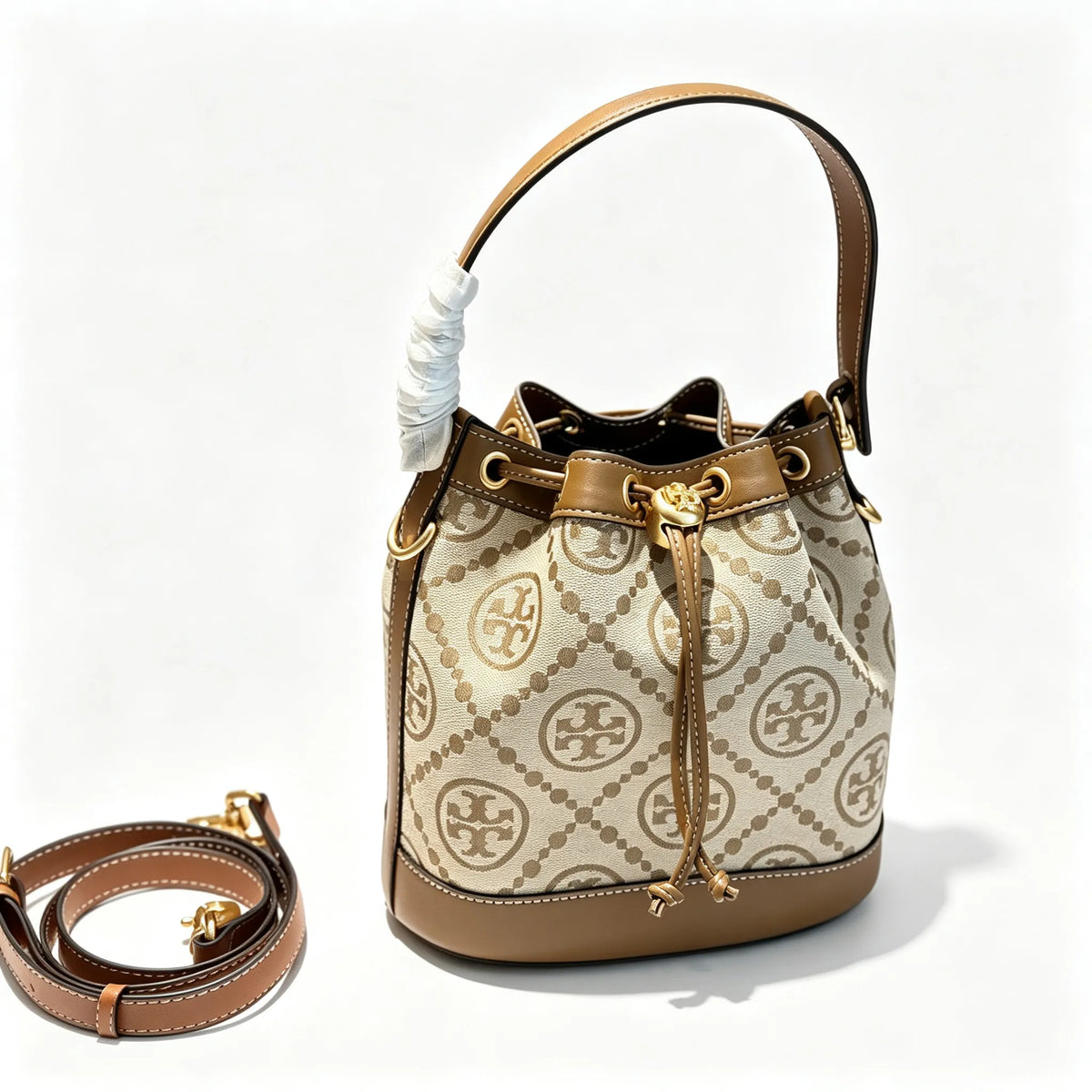 Tory Burch T Monogram | Beige and hazelnut jacquard fabric  drawstring closure and adjustable shoulder strap women's casual and weekend getaway tote bag