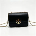 Tory Burch Eleanor | Black leather adjustable chain shoulder strap multiple carrying options women's designer handbag