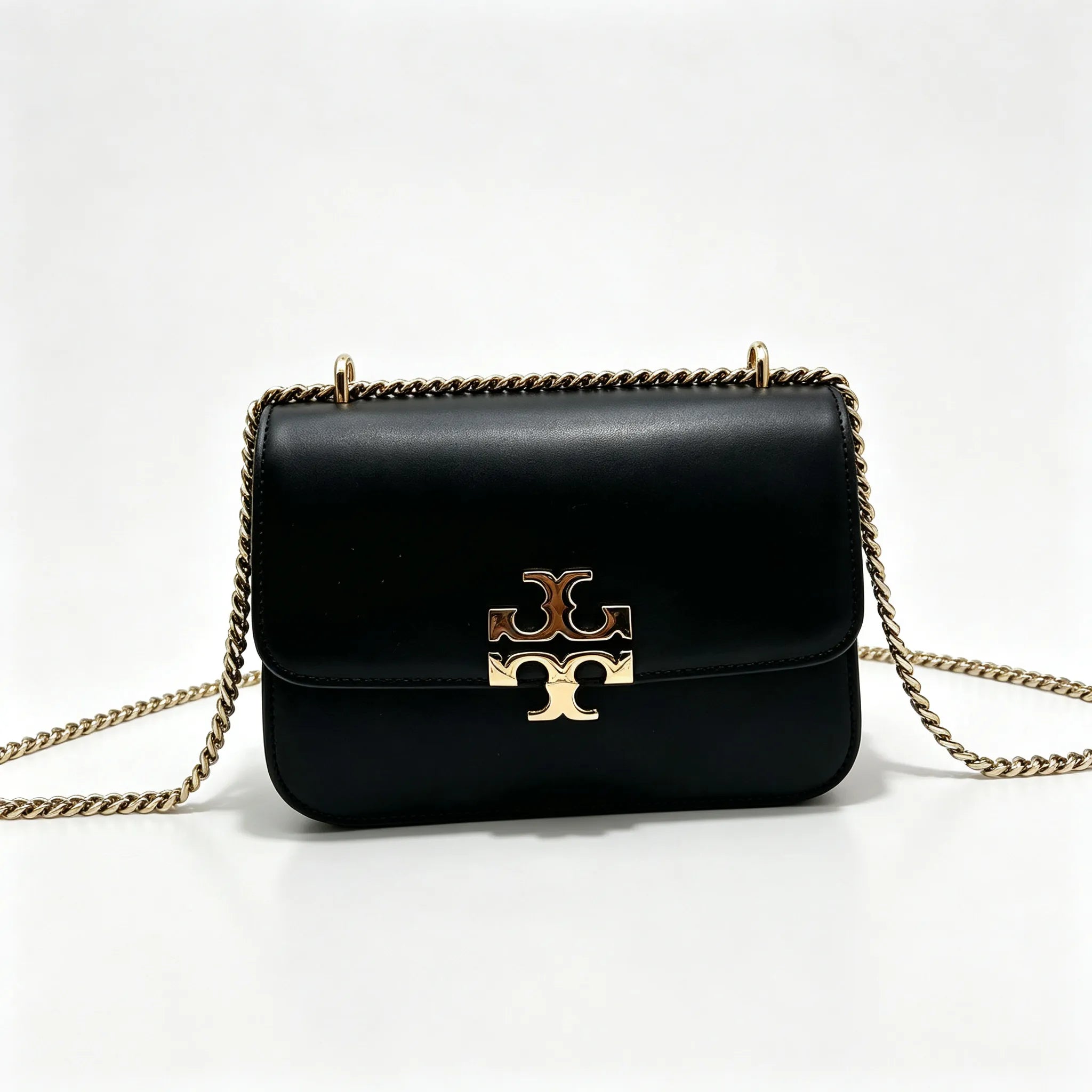 Tory Burch Eleanor | Black leather adjustable chain shoulder strap multiple carrying options women's designer handbag