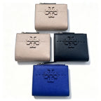 Tory Burch McGraw black pebbled leather wallet with multiple card slots and a zippered coin pocket small foldable women's wallet