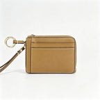 Tory Burch T-pattern keychain card holder | Hazelnut brown canvas with letter pattern multi-card slots comes with a detachable wrist strap  T-pattern keychain card holder