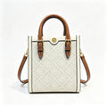 Tory Burch T Monogram | Off-white embossed canvas with brown leather trim detachable shoulder strap  women's designer mini handbag