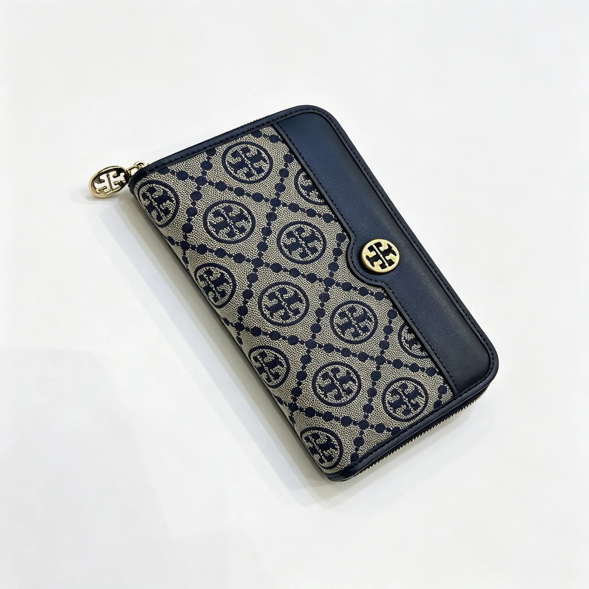 Tory Burch T Monogram wallet in navy and beige Monogram canvas, long with multiple card slots and a zipper