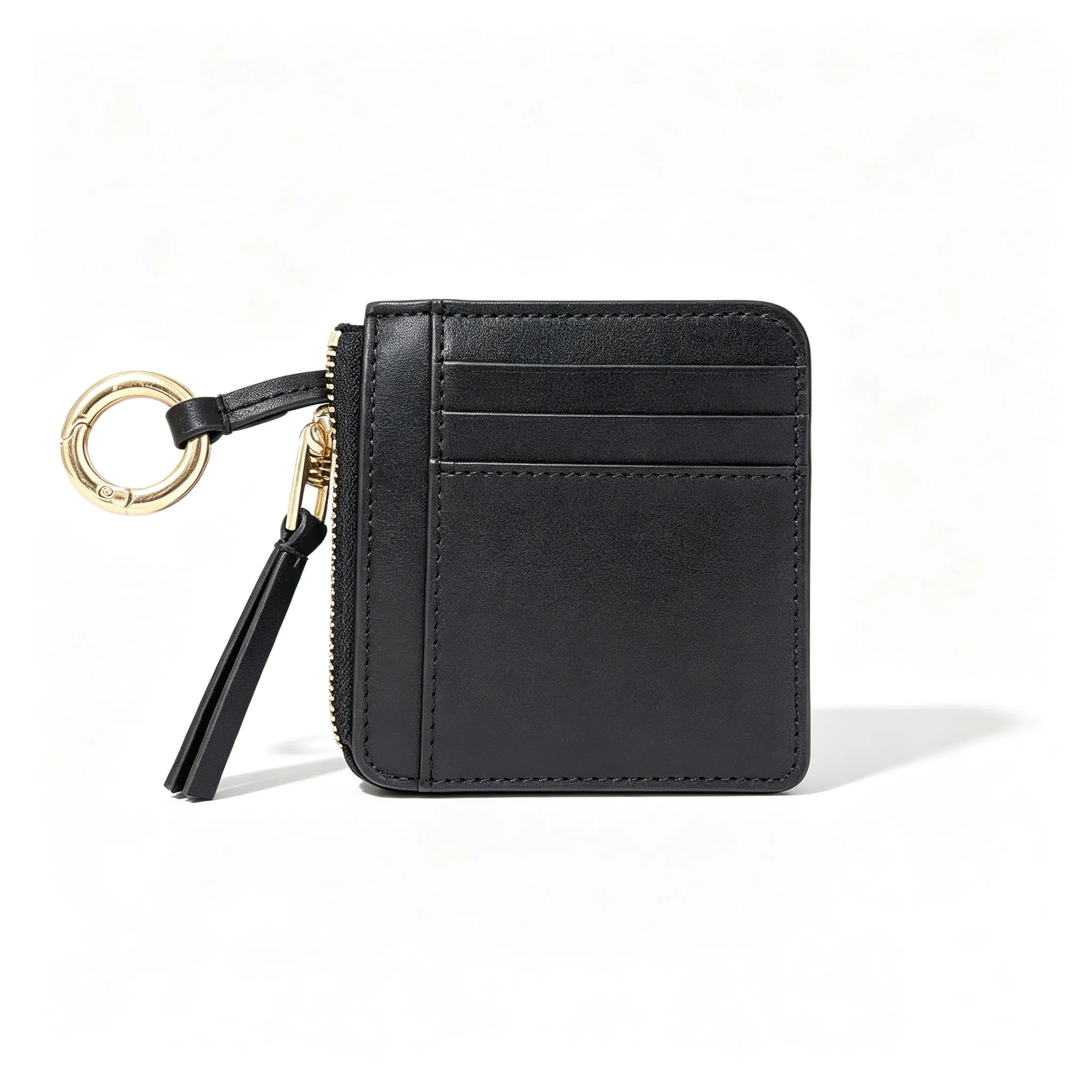 Tory Burch | Black embossed leather  multi-card slot design comes with a detachable wrist strap compact and portable  suitable for everyday use and travel