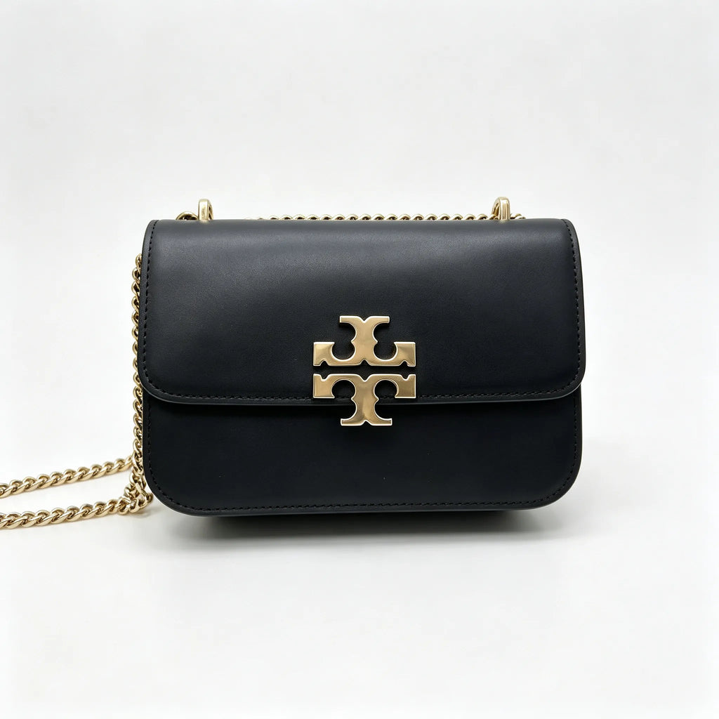 Tory Burch Eleanor | Black leather adjustable chain shoulder strap multiple carrying options women's designer handbag