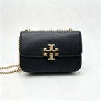 Tory Burch Eleanor | Black leather adjustable chain shoulder strap multiple carrying options women's designer handbag