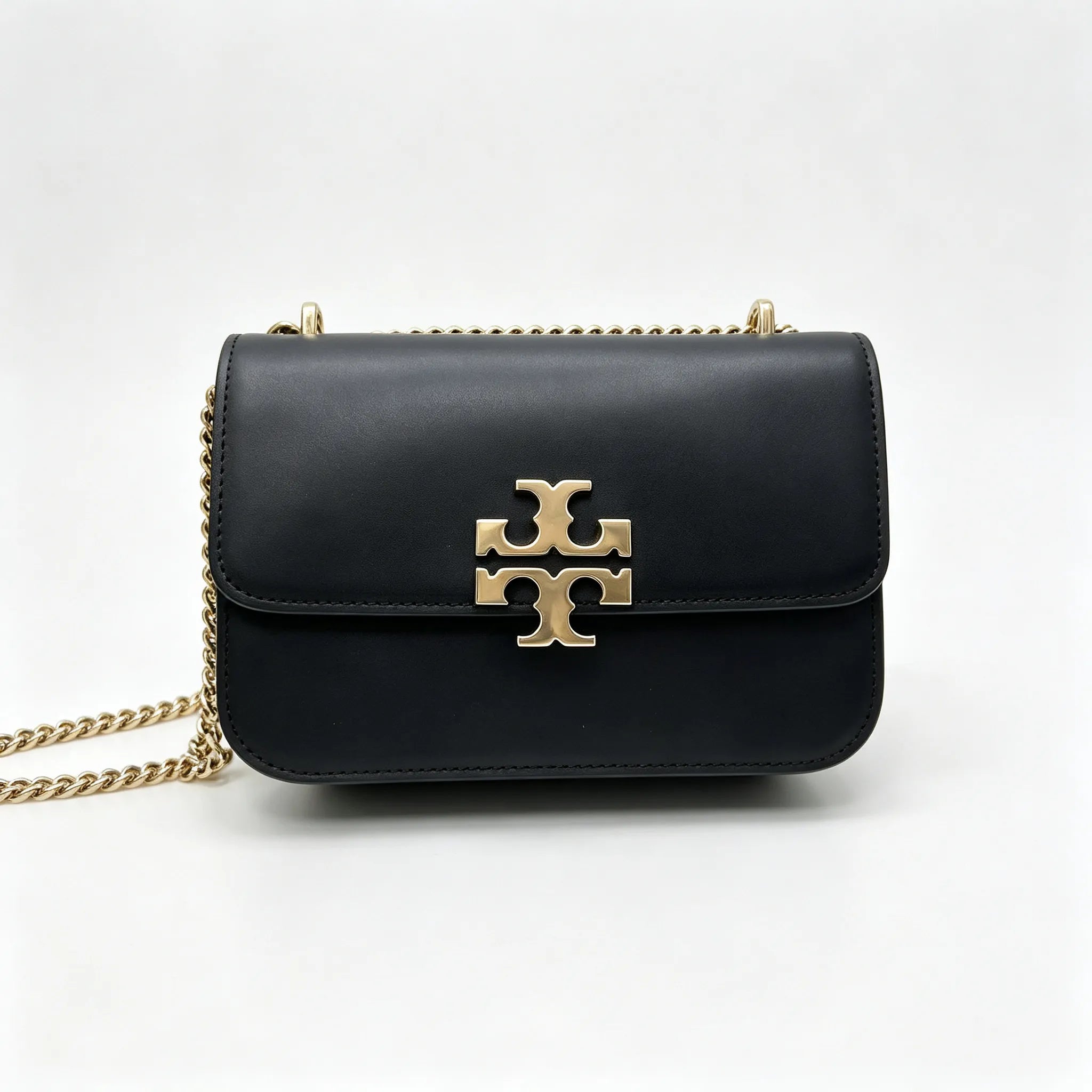 Tory Burch Eleanor | Black leather adjustable chain shoulder strap multiple carrying options women's designer handbag