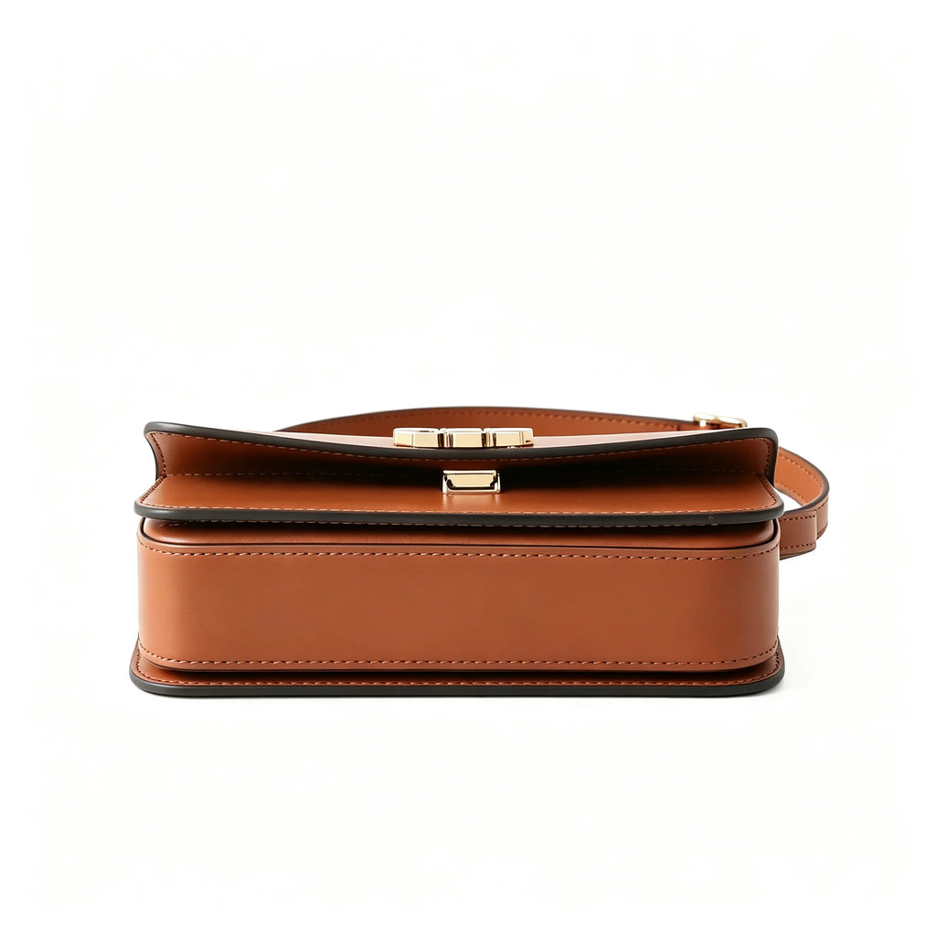 Tory Burch Eleanor | Caramel brown Nappa leather  adjustable shoulder strap  multiple carrying options  women's designer handbag