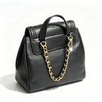Tory Burch Fleming, black lambskin quilted front pocket and tassel drawstring adjustable chain shoulder strap, women's mini backpack