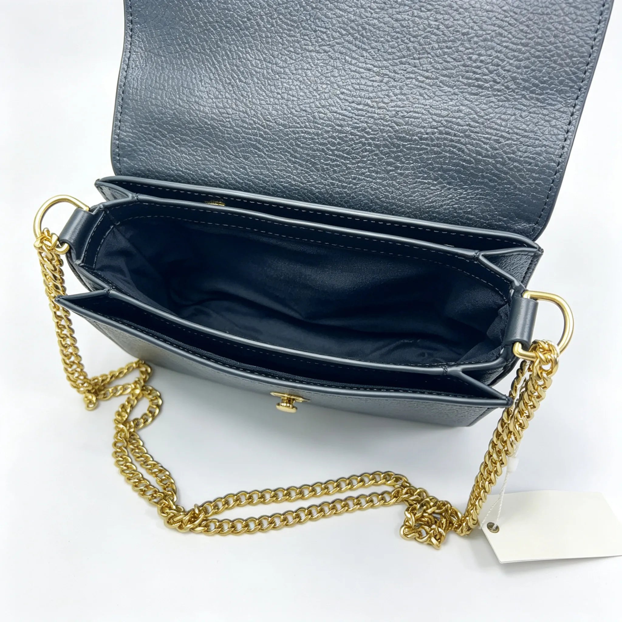 Tory Burch Chelsea | Black pebbled leather with a detachable chain and leather shoulder strap multiple carrying options women's designer handbag