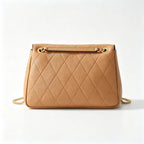 Tory Burch Kira | Mocha brown pebbled leather  adjustable chain shoulder strap multiple carrying options  women's designer handbag