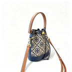 Tory Burch T Monogram | Navy blue and beige Monogram fabric leather trim  adjustable shoulder strap drawstring closure  women's designer mini jacquard bucket bag