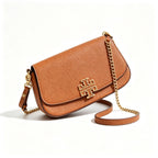 Tory Burch Britten caramel brown adjustable shoulder strap and zippered lining a small everyday bag for women
