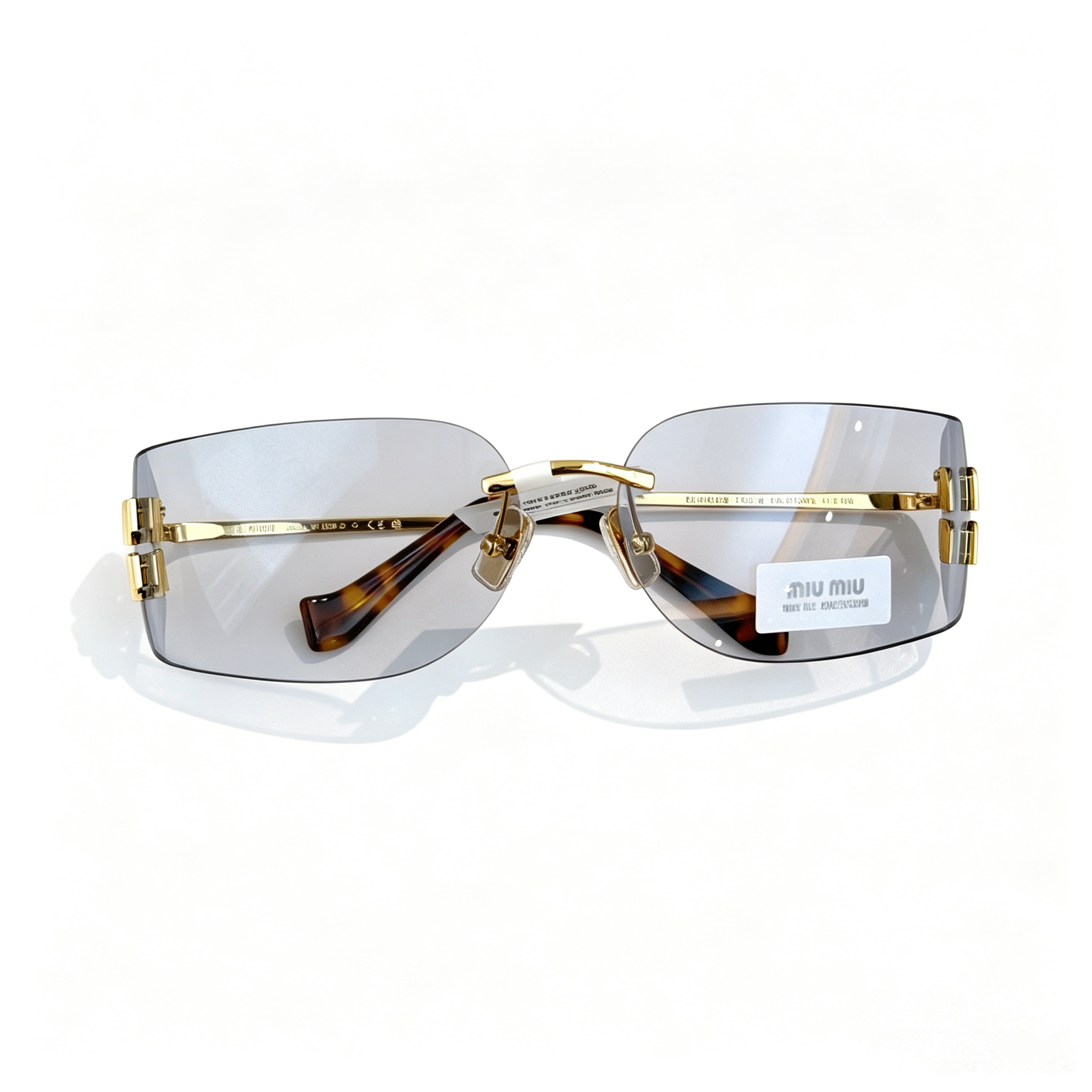 Miu Miu SMU A51S series frameless curved sunglasses