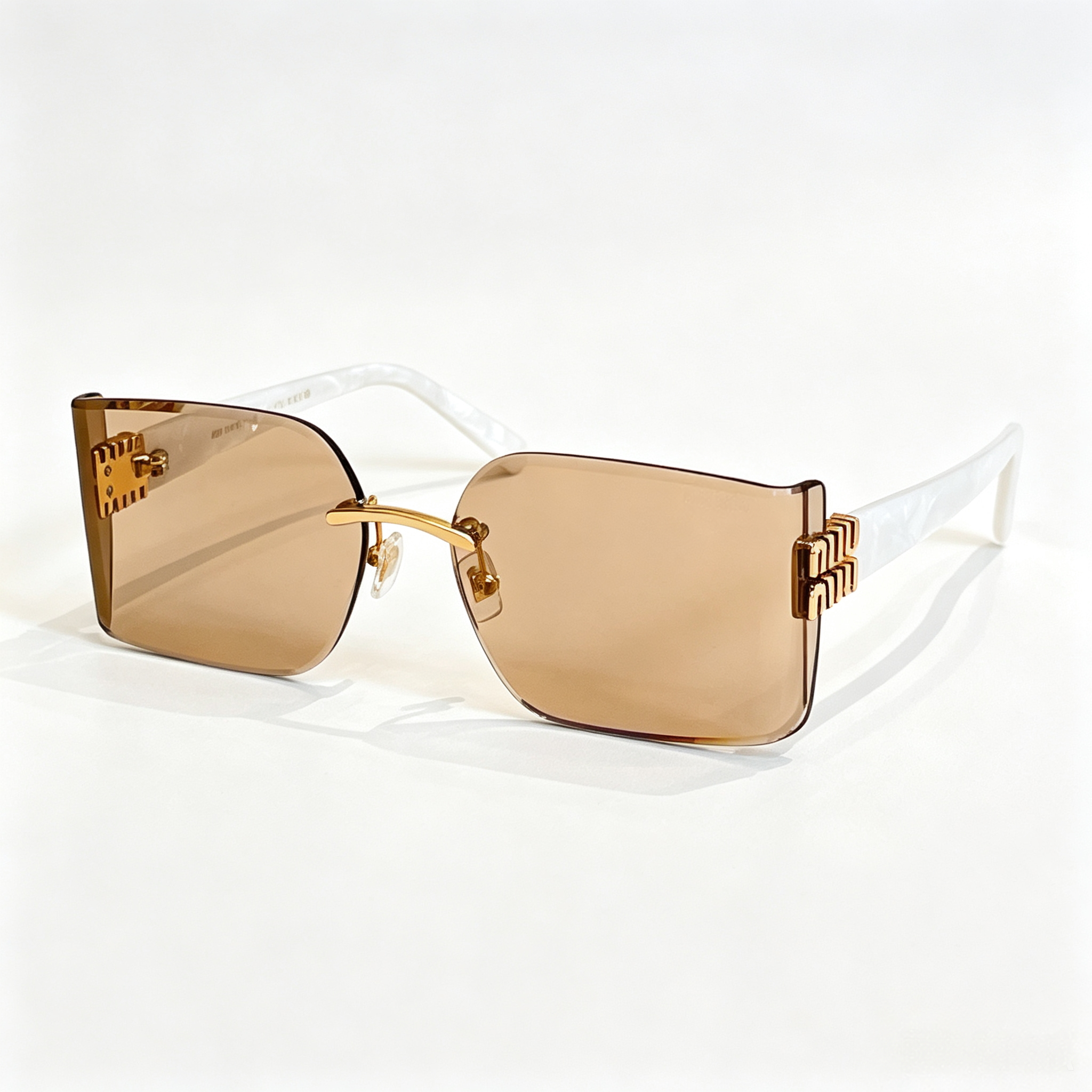 Miu Miu MU 112AV series frameless square sunglasses